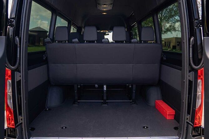 Arrival Private Transfer Vancouver YVR or Cruise Port to Vancouver by Minibus - YVR Arrival: Wooden Statues, Then Straight to Your Driver