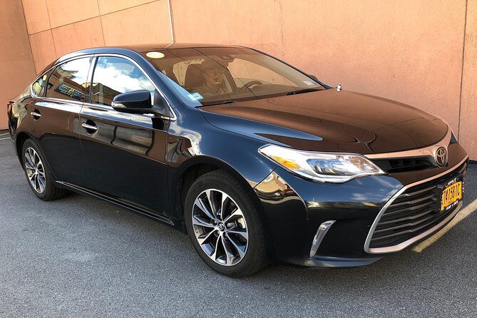 Private Arrival Transfer from Vancouver Airport (YVR) - The pickup process: voucher check-in, phone numbers, and luggage rules