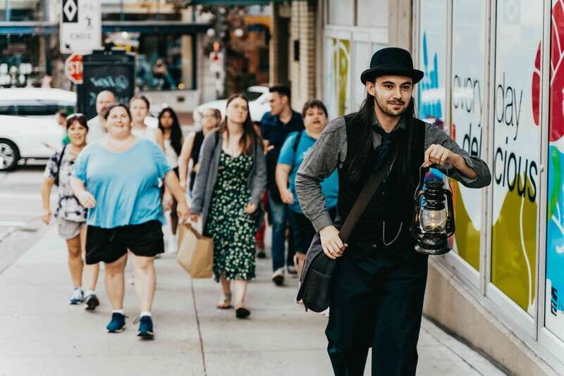 Vancouver: Lost Souls of Gastown Tour - Entering Gastown through lamplight theatre